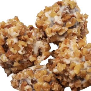 Carrot Walnut Crunch: A spiced carrot cake ball, studded with walnuts, then generously coated in white chocolate and rolled in more toasted walnuts for a satisfying crunch.