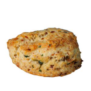 A savory delight featuring ham, cheddar cheese, onion, and green pepper, baked into a flaky scone. A hearty and satisfying treat, perfect for breakfast or brunch.